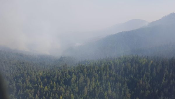 mountains obscured by wildfire smoke