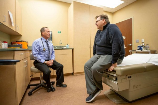 camas center clinic, patient and doctor in exam room